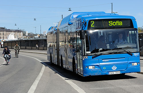  Cyclist and #2 Sofia bus on Södermalm island in Stockholm